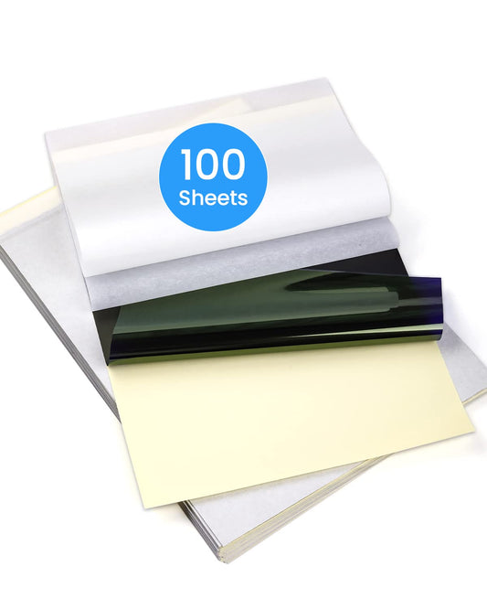 A fanned stack of Phomemo A4 Tattoo Transfer Paper reveals a mix of black, white, and translucent sheets. The blue sticker reads 100 Sheets. Its perfect for use with thermal tattoo stencil printers like the M08F, ensuring high-quality transfers every time.