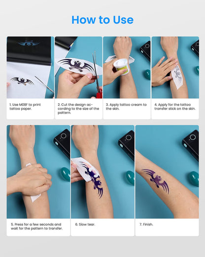 Learn how to apply a temporary tattoo with Phomemo A4 Tattoo Transfer Paper (100 Sheets, Compatible with M08F): Print your design using a thermal stencil printer, cut it out, apply cream to your skin, place the tattoo on top, press firmly, and slowly remove the paper to unveil your arm art.